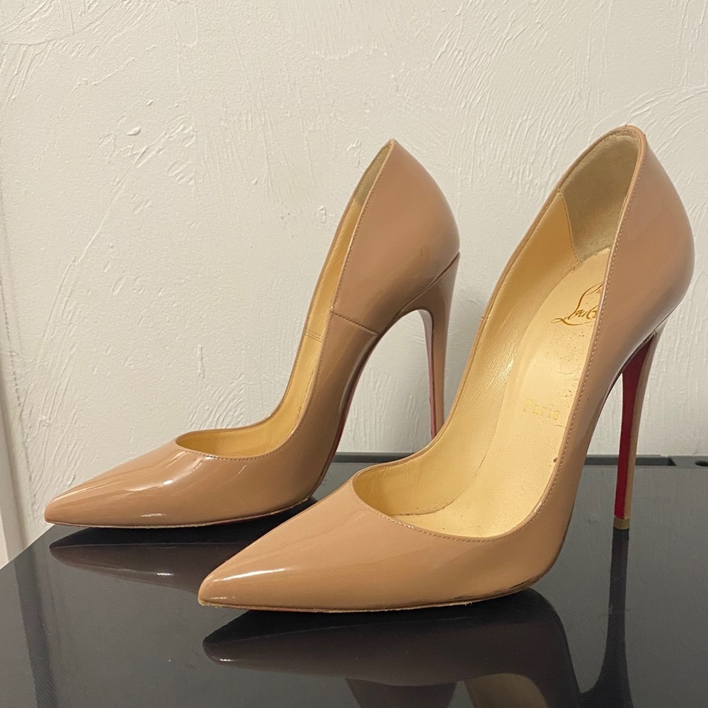 Christian LouBoutin Red Buttoms